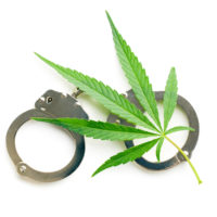 Marijuana leaf and handcuffs.jpg.crdownload